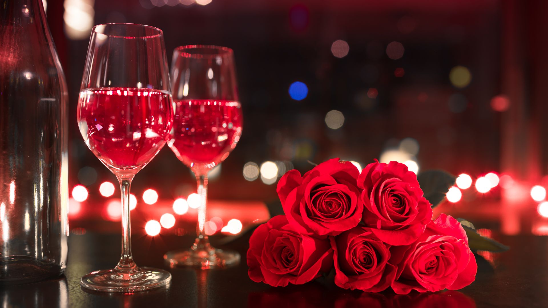 Valentine’s Day romantic dinner with red wine and red roses